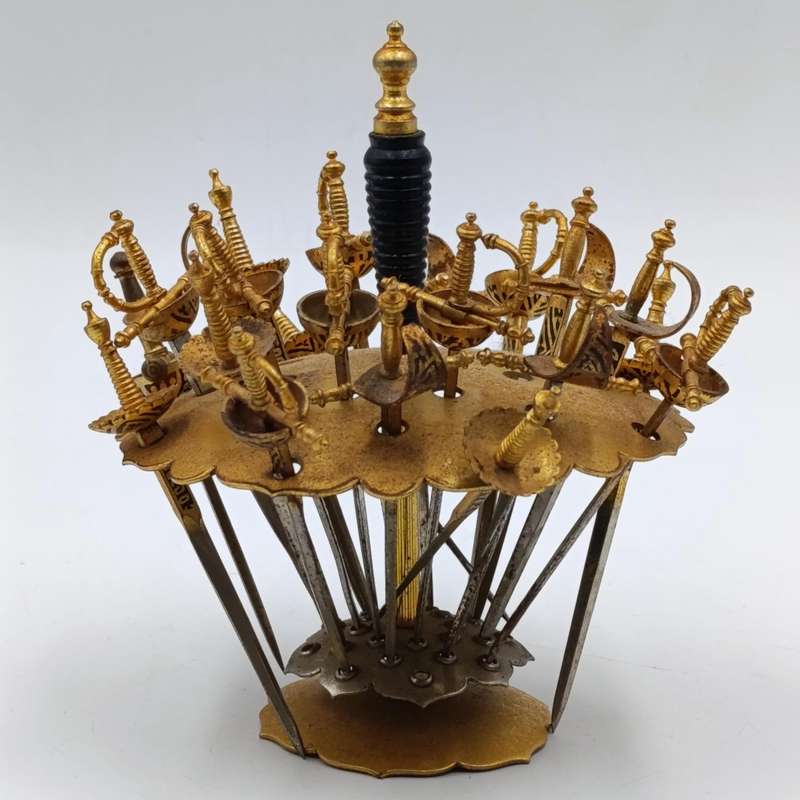Vintage Toledo fondue sword set with only 20 of the 2 swords