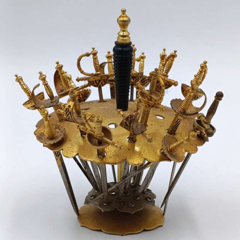 Vintage Toledo fondue sword set with only 20 of the 2 swords