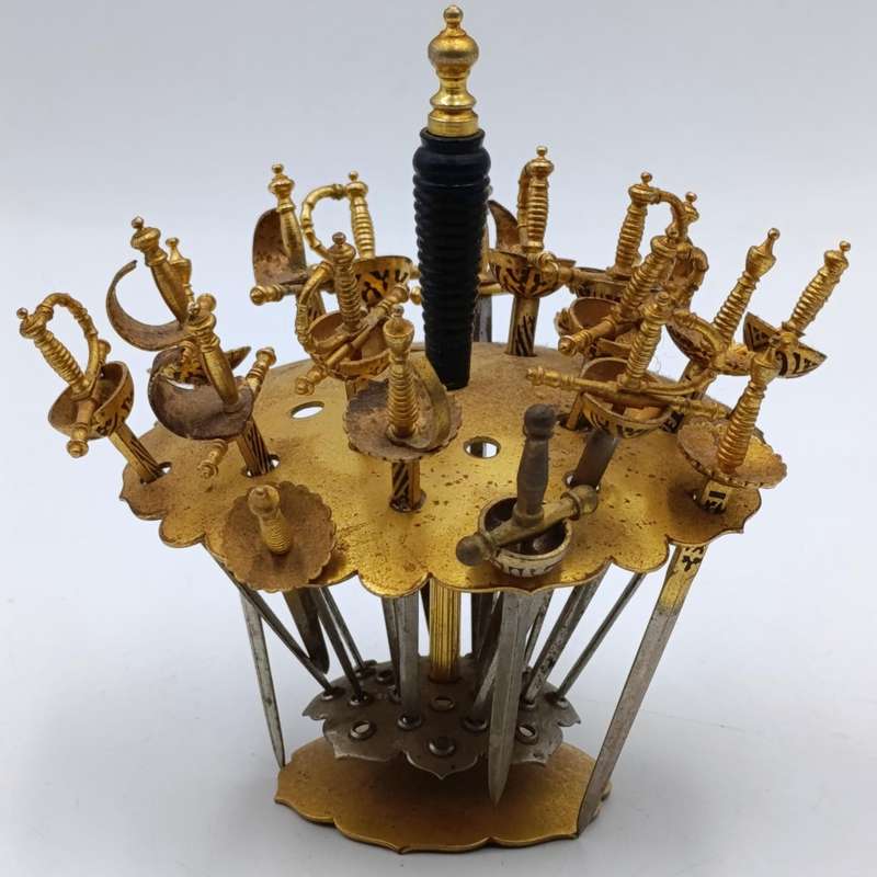 Vintage Toledo fondue sword set with only 20 of the 2 swords