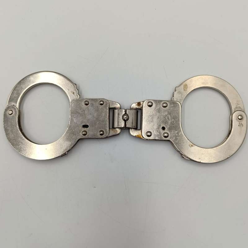 Vintage leather handcuff pouch with handcuffs