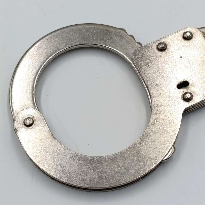 Vintage leather handcuff pouch with handcuffs