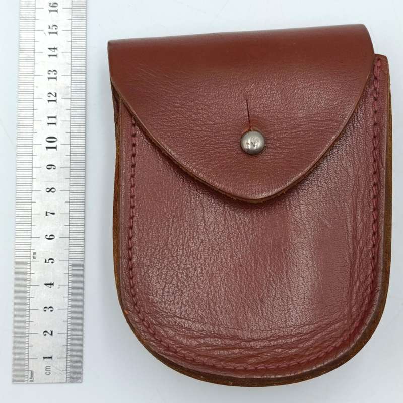 Vintage leather handcuff pouch with handcuffs