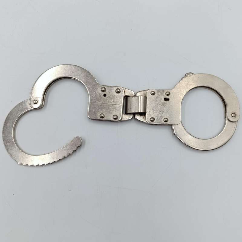 Vintage leather handcuff pouch with handcuffs