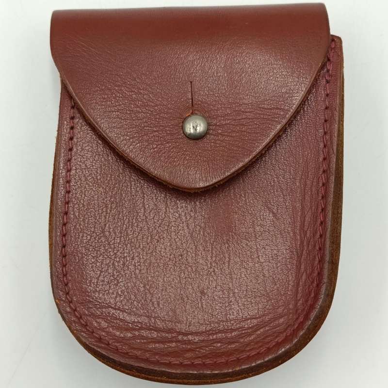 Vintage leather handcuff pouch with handcuffs