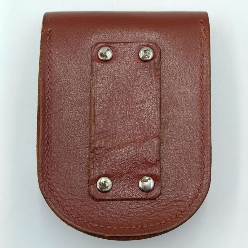 Vintage leather handcuff pouch with handcuffs
