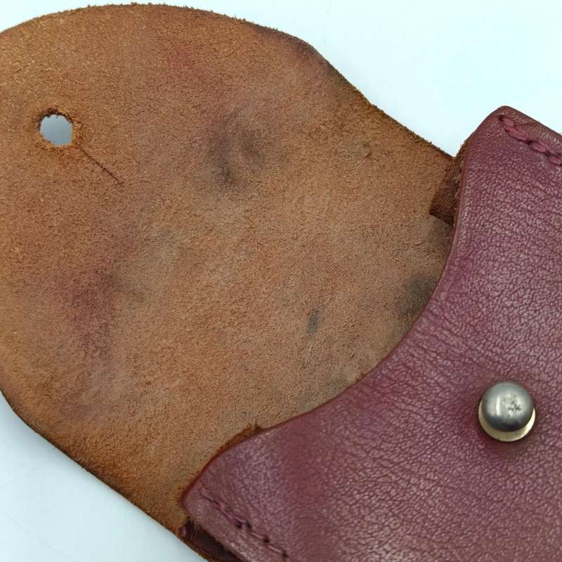 Vintage leather handcuff pouch with handcuffs