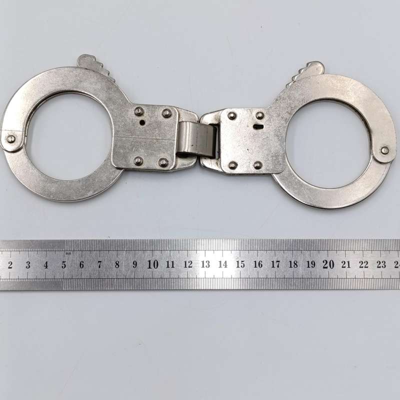 Vintage leather handcuff pouch with handcuffs