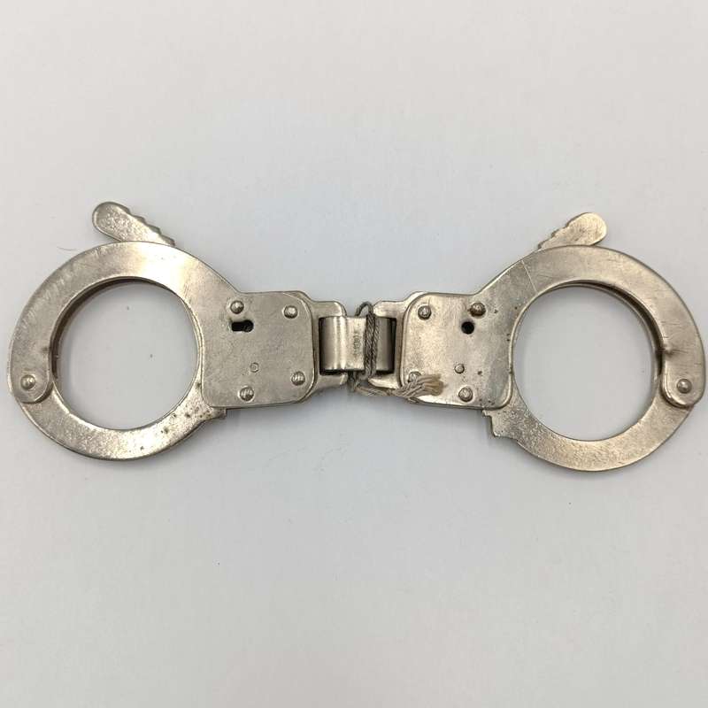 Pair of handcuffs in pouch