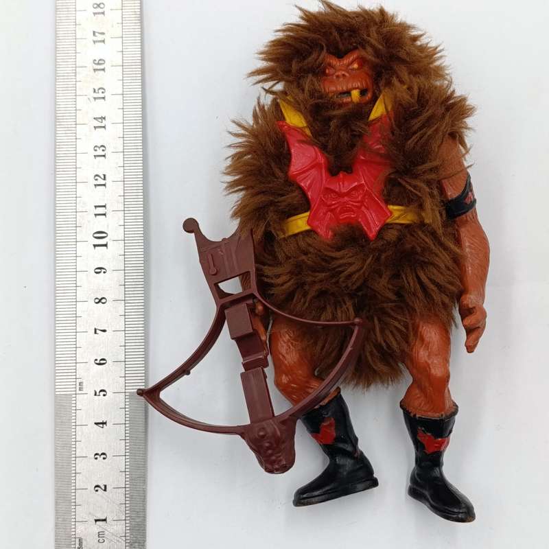 Vintage Masters of the Universe Grizzlor action figurine with weapon
