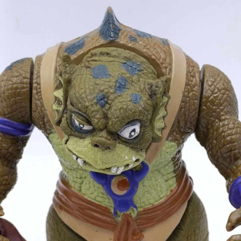 Vintage Thundercats Slithe action figurine with weapon
