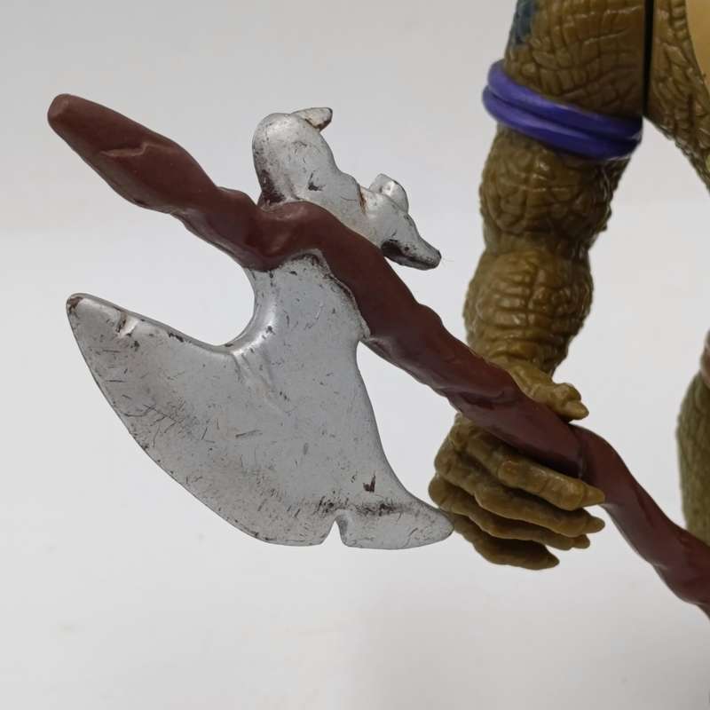 Vintage Thundercats Slithe action figurine with weapon