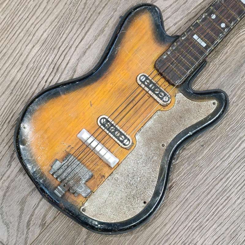 Vintage Japanese tin plate toy guitar - need some TLC