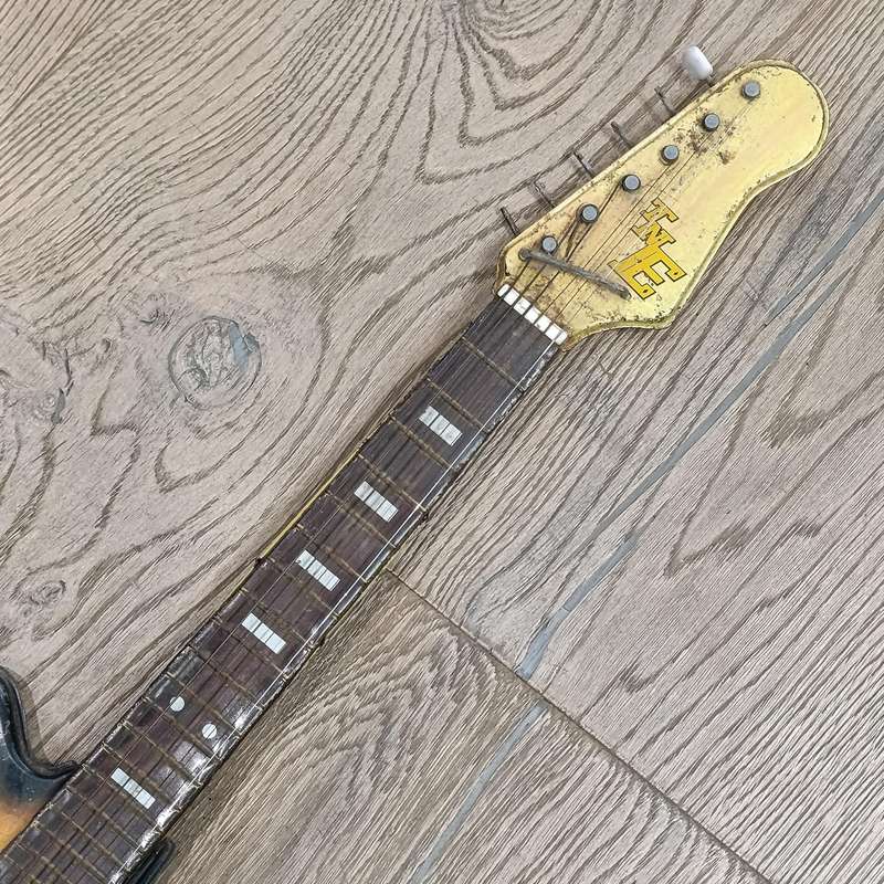 Vintage Japanese tin plate toy guitar - need some TLC