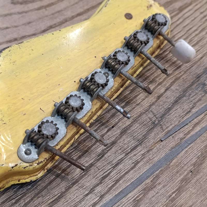 Vintage Japanese tin plate toy guitar - need some TLC