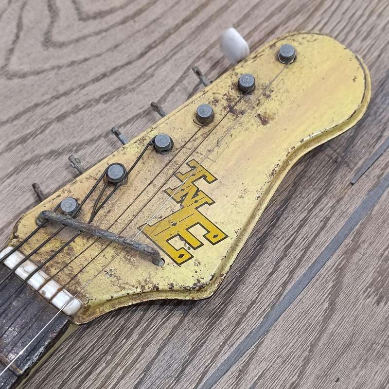 Vintage Japanese tin plate toy guitar - need some TLC