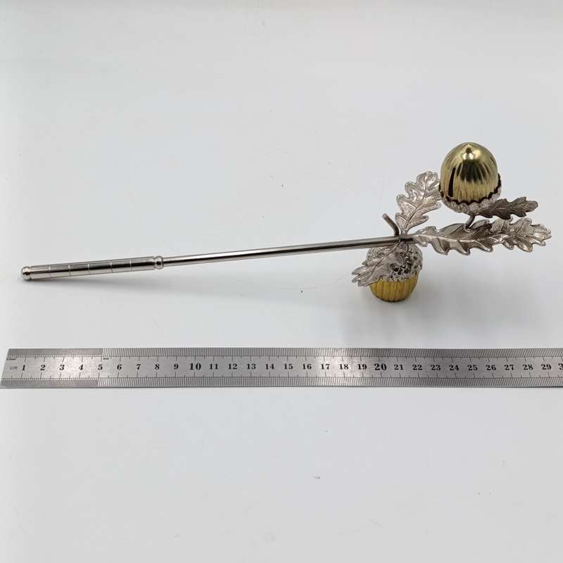 Acorn shaped candle snuffer