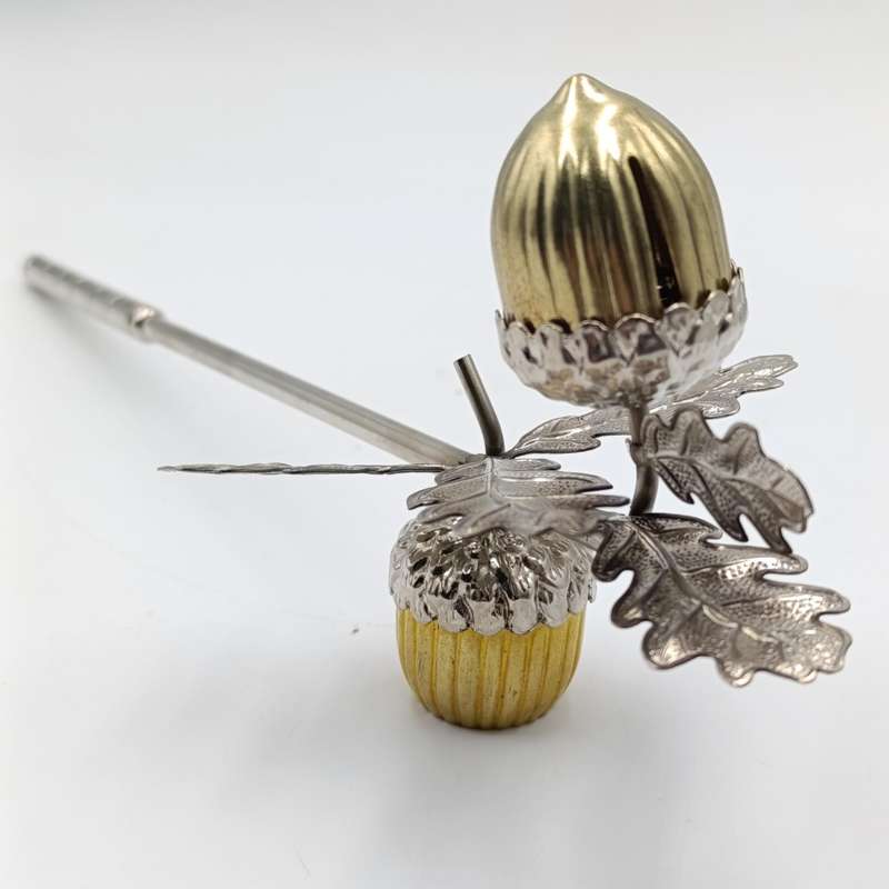 Acorn shaped candle snuffer