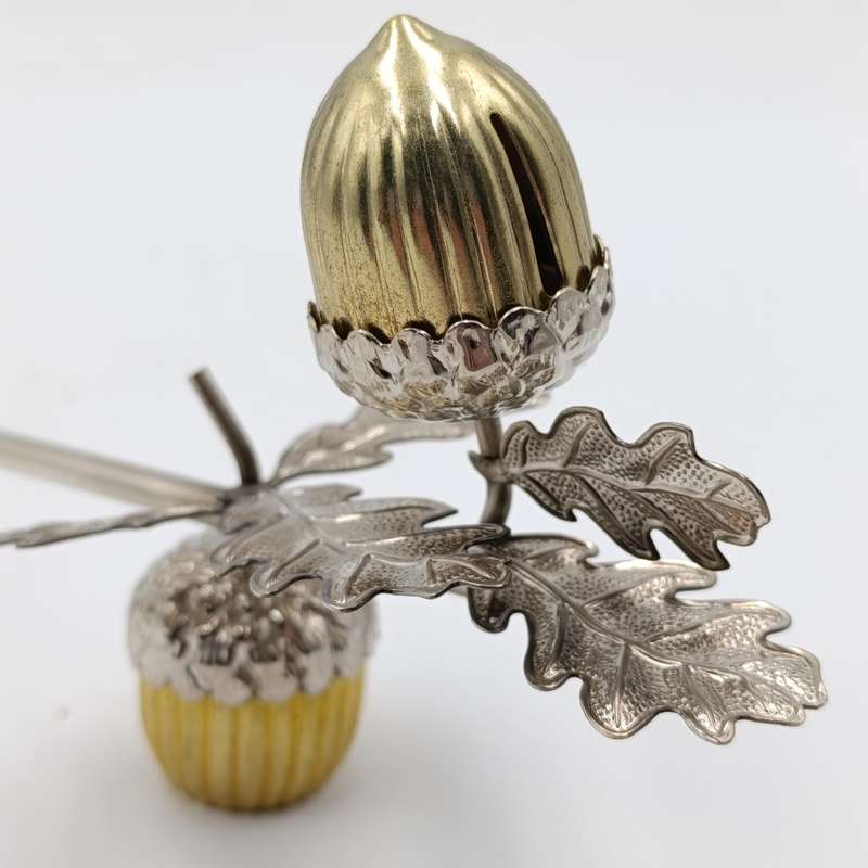 Acorn shaped candle snuffer