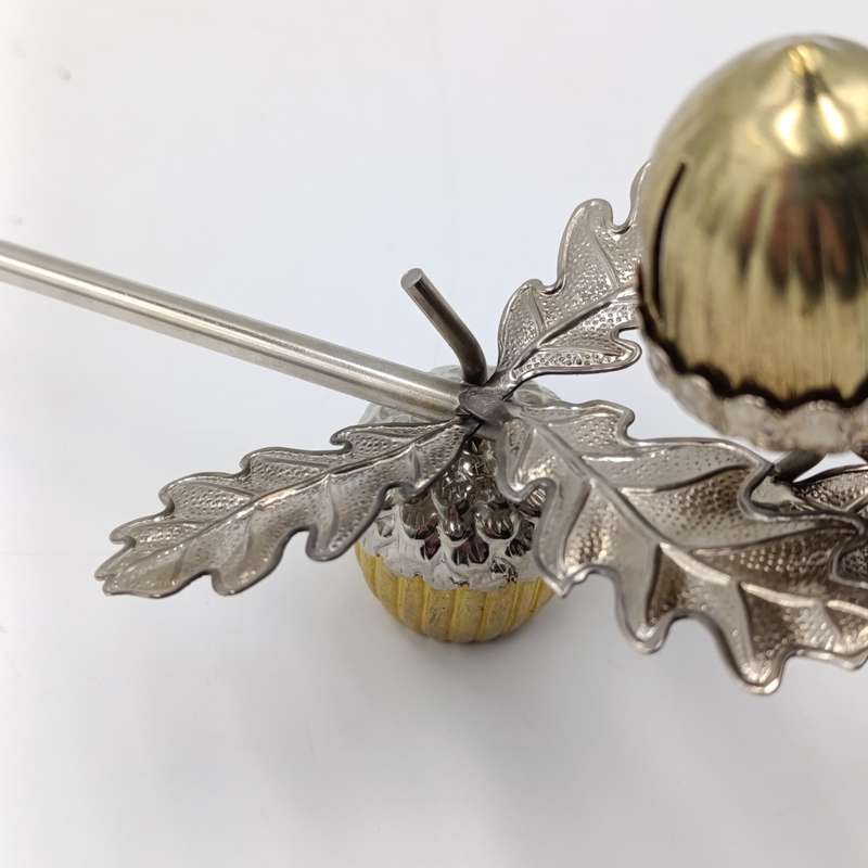 Acorn shaped candle snuffer
