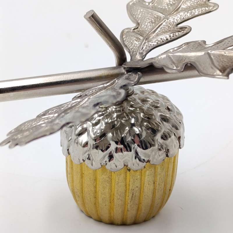Acorn shaped candle snuffer