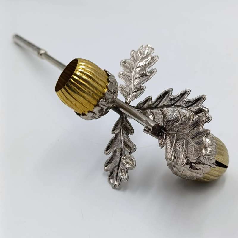 Acorn shaped candle snuffer