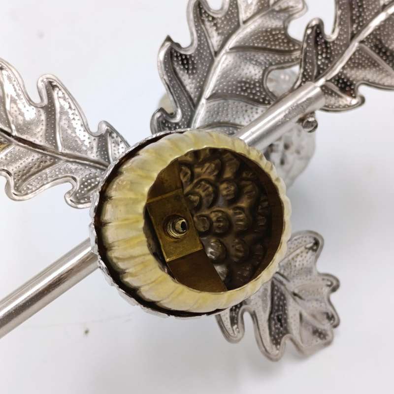 Acorn shaped candle snuffer