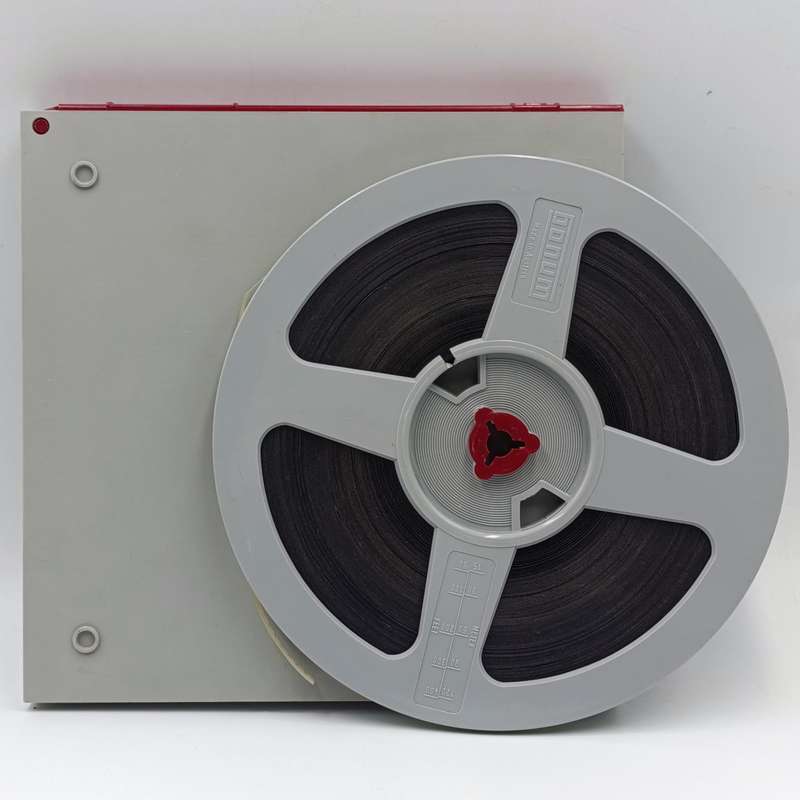 Vintage 8mm film reel and photo slides of Friesland cattle on Sir de Villiers Graaf farm