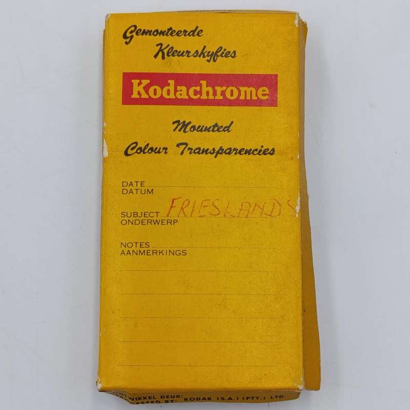 Vintage 8mm film reel and photo slides of Friesland cattle on Sir de Villiers Graaf farm
