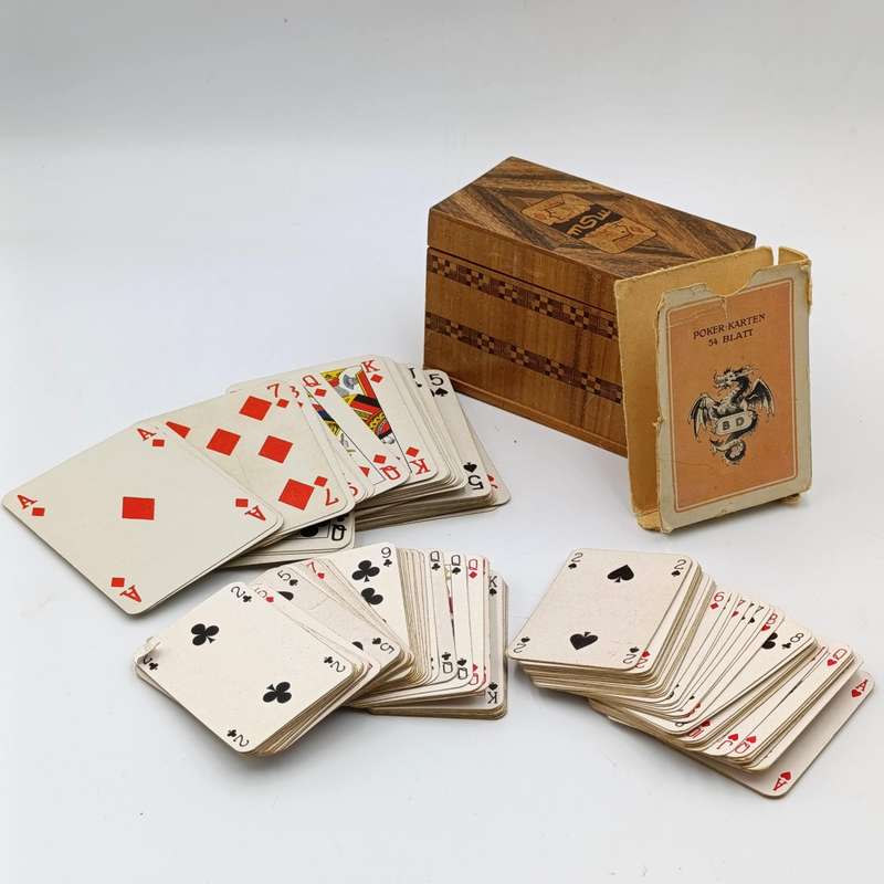 Pack of Deutsche Afrika-Linien playing cards plus two smaller deck of cards in wooden box