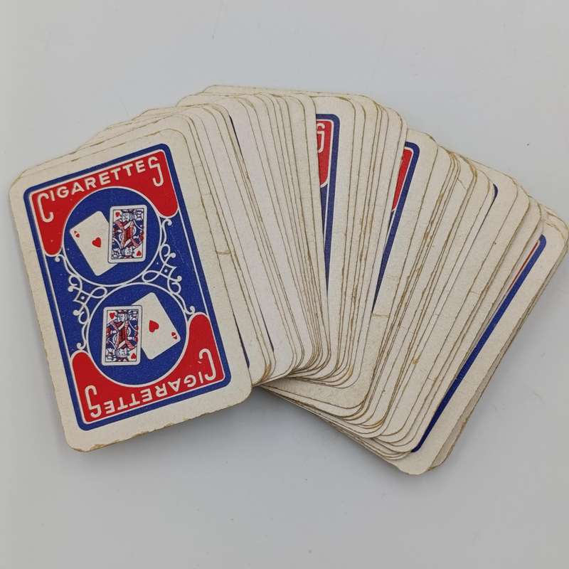 Pack of Deutsche Afrika-Linien playing cards plus two smaller deck of cards in wooden box
