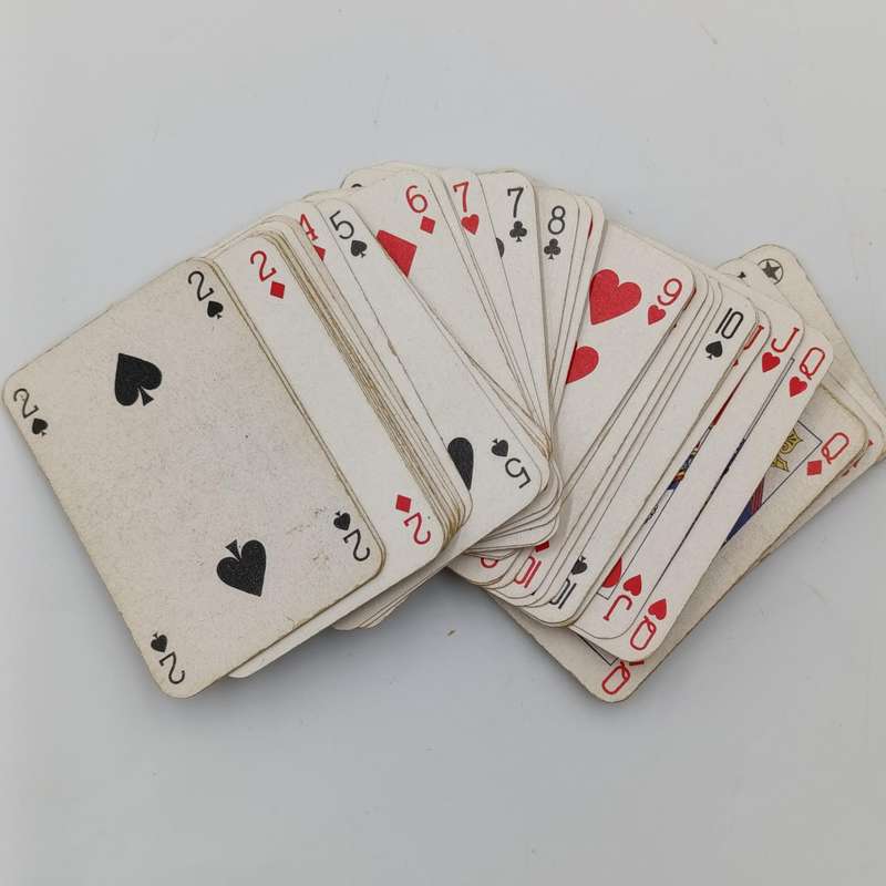 Pack of Deutsche Afrika-Linien playing cards plus two smaller deck of cards in wooden box