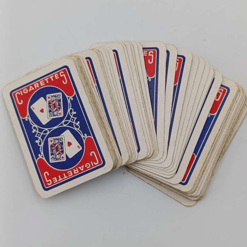 Pack of Deutsche Afrika-Linien playing cards plus two smaller deck of cards in wooden box