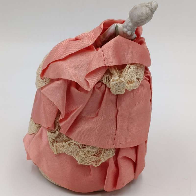 Antique porcelain doll needle cushion
