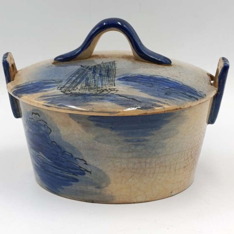 Antique blue and white pottery dish with lid
