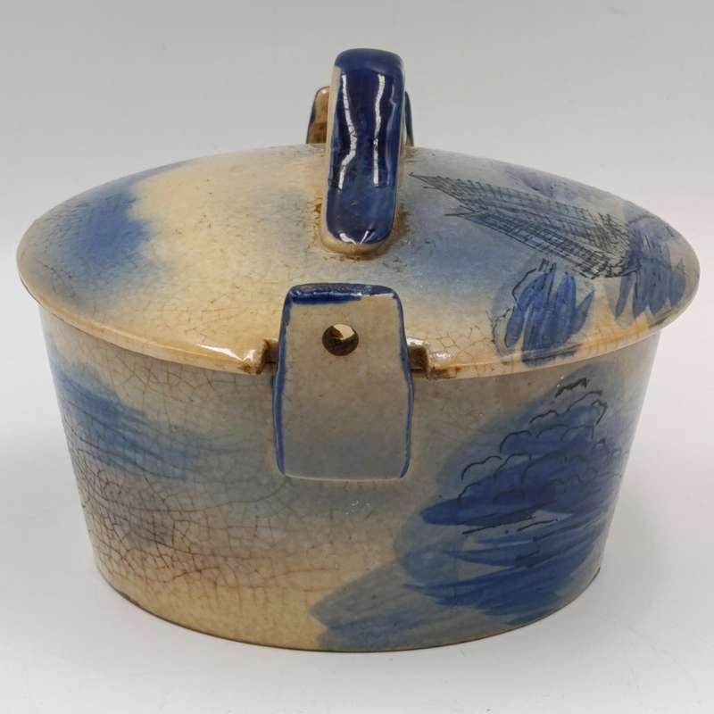Antique blue and white pottery dish with lid