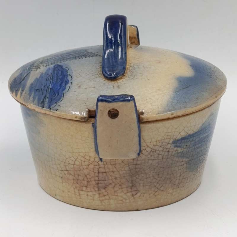 Antique blue and white pottery dish with lid