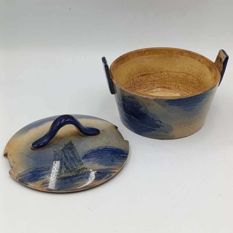 Antique blue and white pottery dish with lid