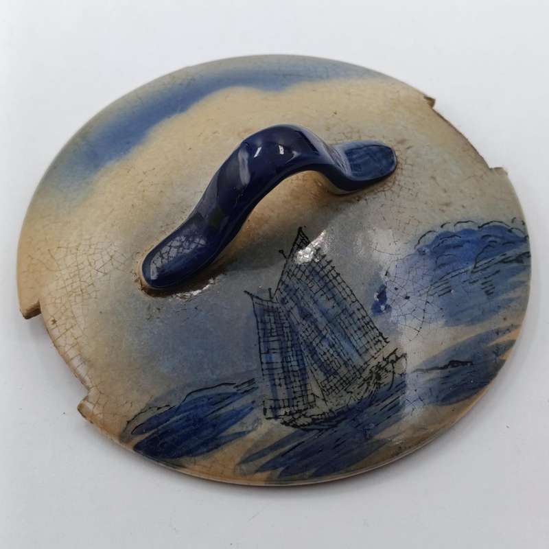 Antique blue and white pottery dish with lid