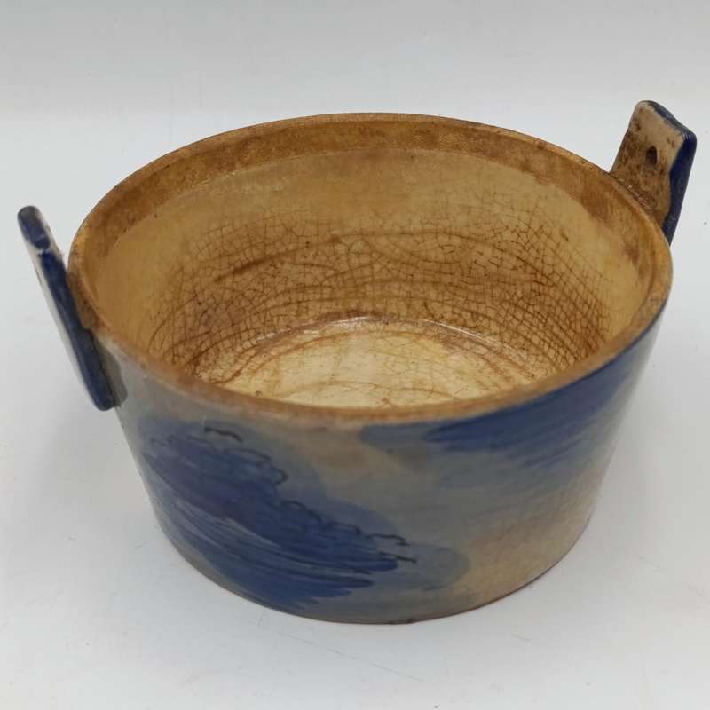 Antique blue and white pottery dish with lid
