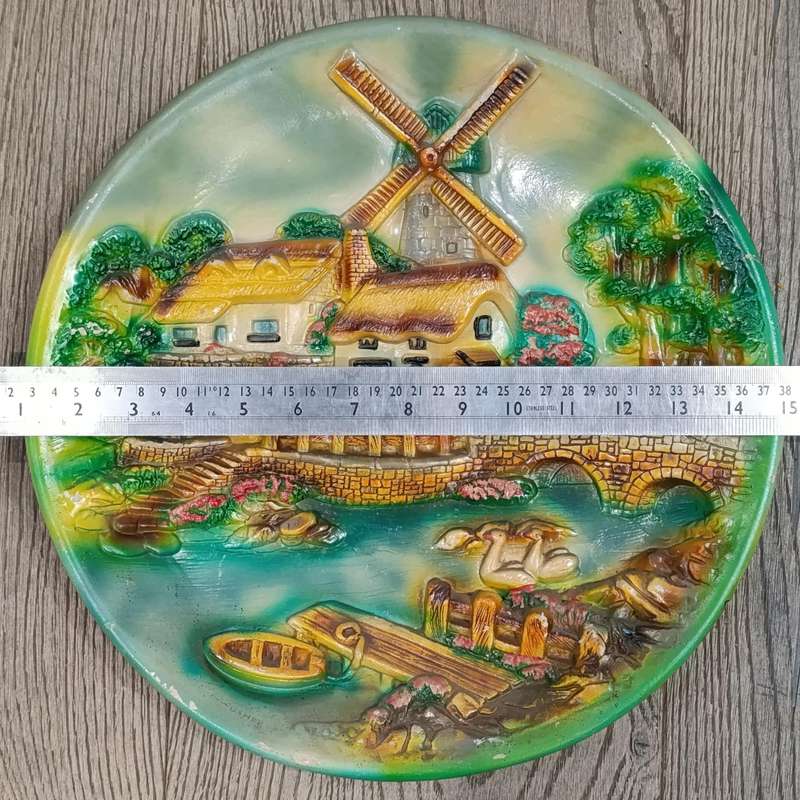 Vintage Dutch themed plaster wall plate
