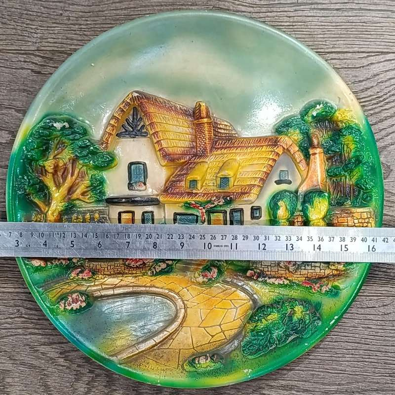 Vintage Dutch themed plaster wall plate