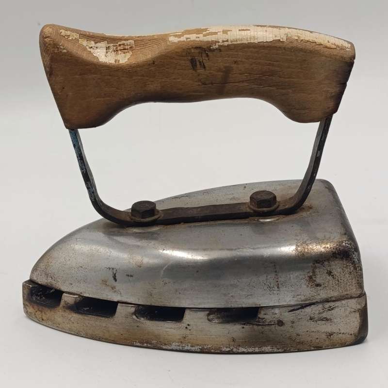 Vintage gas heated sad iron with heating stand