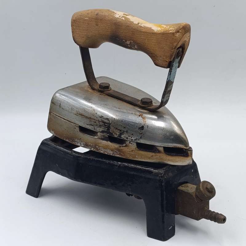 Vintage gas heated sad iron with heating stand