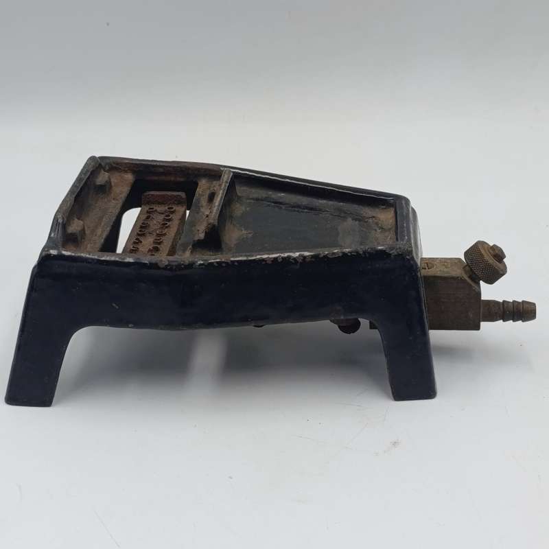 Vintage gas heated sad iron with heating stand