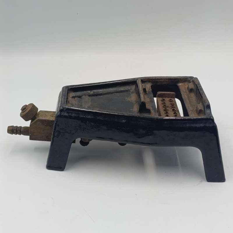 Vintage gas heated sad iron with heating stand