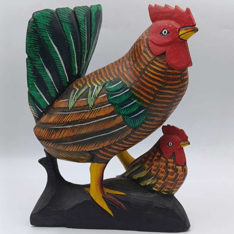 Beautiful wooden carved rooster with chick