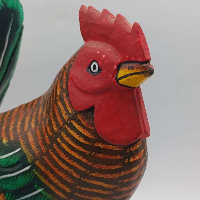 Beautiful wooden carved rooster with chick