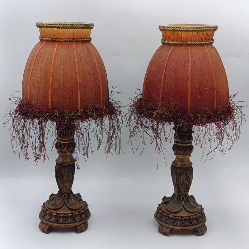 Pair of very unique resin candle holders with lamp-shade styled candles