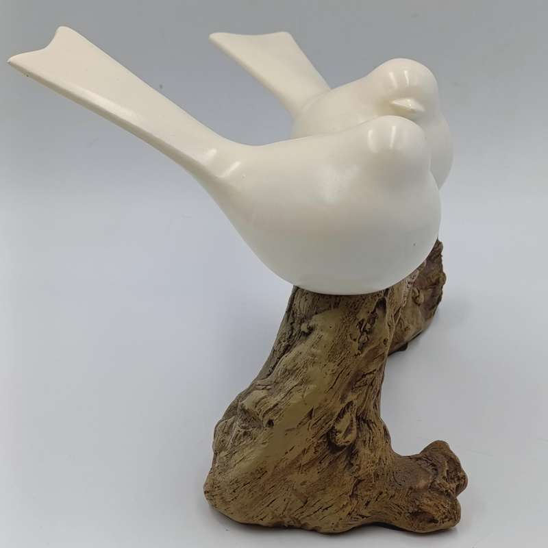 Beautiful birds on log figurine - polyresin