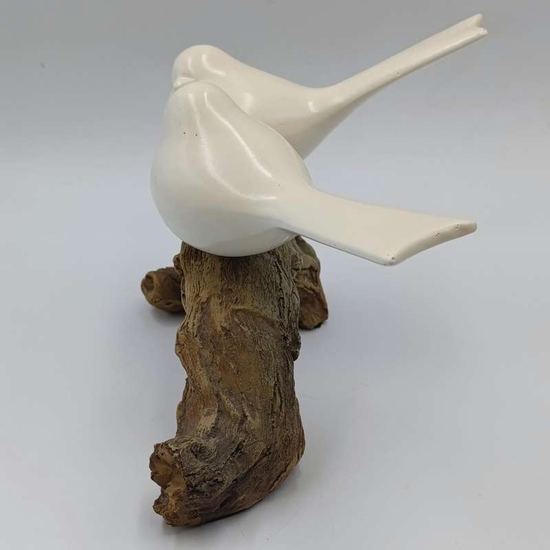 Beautiful birds on log figurine - polyresin